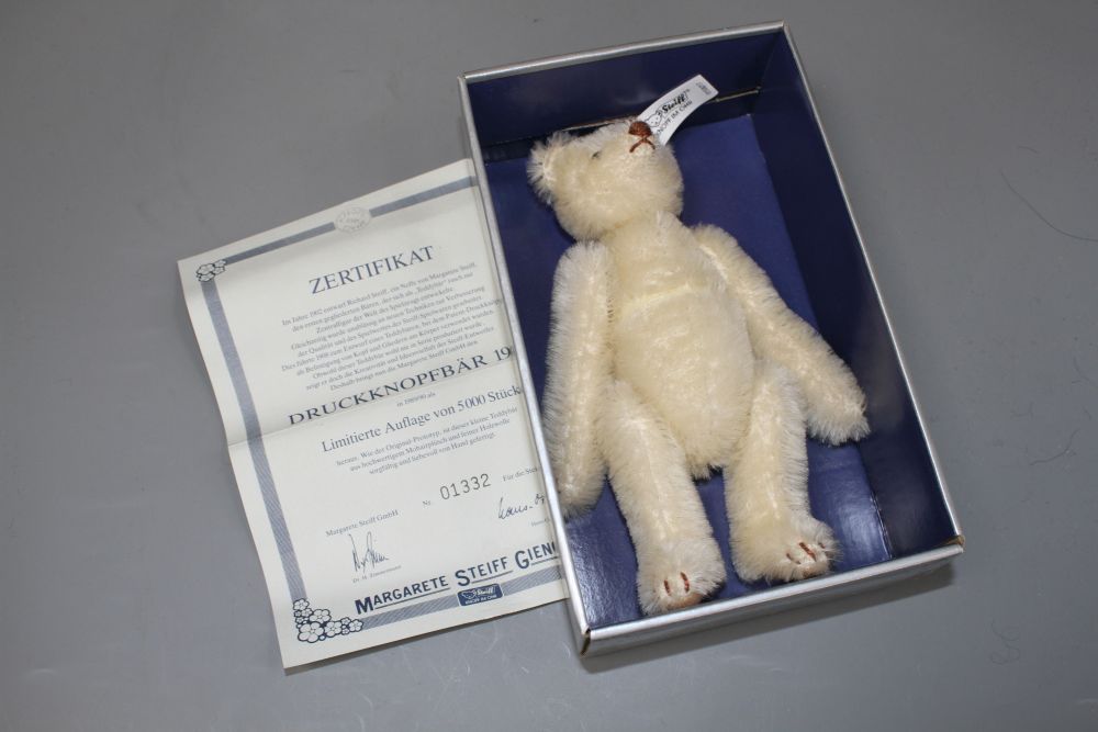 Four Steiff boxed limited edition teddy bears: a 1912 Replica, a 1906 Replica, Petsy 1927 and Snap-A-Part-Teddy bear 1908